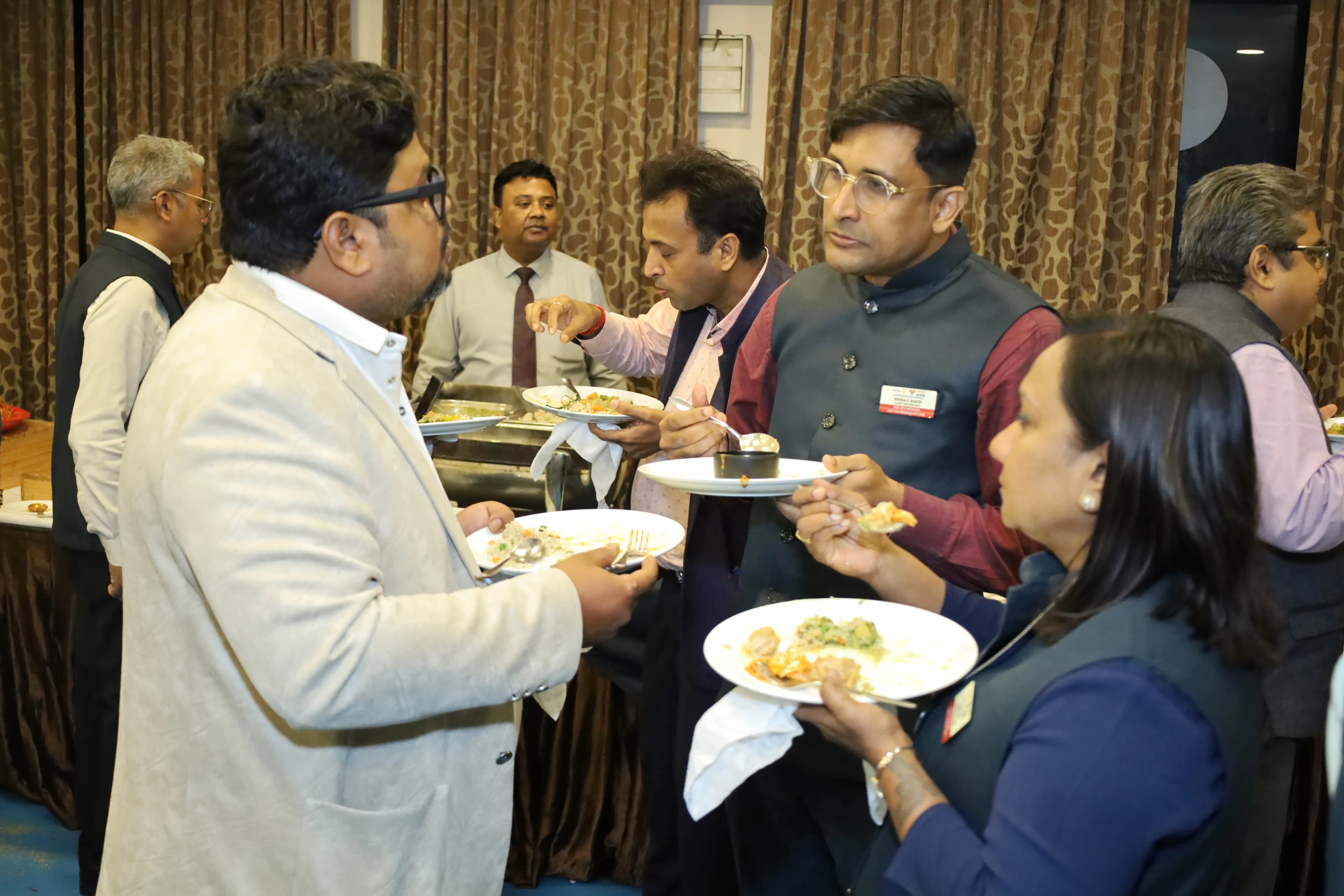 RMBF Kolkata members sharing a meal at a chapter meeting